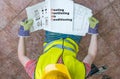 Plumber is looking at documentation of HVAC Royalty Free Stock Photo