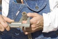 Plumber measures the diameter of the metal tube. Royalty Free Stock Photo