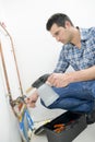 plumber mending pipes Royalty Free Stock Photo