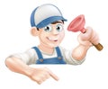 Plumber pointing at sign Royalty Free Stock Photo