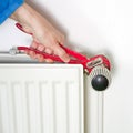 Plumber and radiator Royalty Free Stock Photo