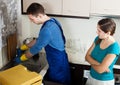 Plumber repairing water lines Royalty Free Stock Photo