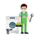 Plumber repairs washing machine. Breakdown of household appliances