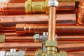 Plumber`s copper pipes and fittings Royalty Free Stock Photo