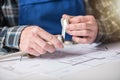 Plumber's hands using teflon tape Royalty Free Stock Photo