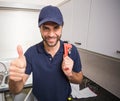 Plumber smiling at the camera Royalty Free Stock Photo