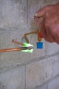Plumber soldering copper pipe