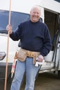 Plumber standing with van Royalty Free Stock Photo