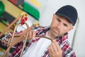 Plumber using welding gas torch to solder copper pipes Royalty Free Stock Photo