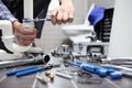 Plumber at work in a bathroom, plumbing repair service, assemble Royalty Free Stock Photo