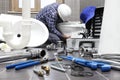 Plumber at work in a bathroom, plumbing repair service, assemble Royalty Free Stock Photo