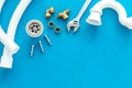 Plumber work with instruments, tools and gear on blue background top view mock up Royalty Free Stock Photo
