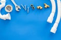 Plumber work with instruments, tools and gear on blue background top view mock up Royalty Free Stock Photo