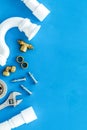 Plumber work with instruments, tools and gear on blue background top view mock up Royalty Free Stock Photo