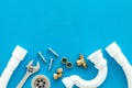 Plumber work with instruments, tools and gear on blue background top view mock up Royalty Free Stock Photo