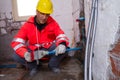 Plumber at work in a site Royalty Free Stock Photo