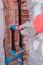 Plumber at work in a site Royalty Free Stock Photo