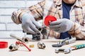 Plumber work on workbench. p