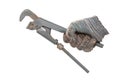 Plumber's hand in glove holding a pipe wrench isolated on white background Royalty Free Stock Photo