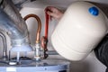Plumbers does maintenance on a hot water heater Royalty Free Stock Photo