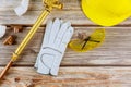 Plumbing copper pipe water supply safety protective gloves construction yellow hard hat helmet