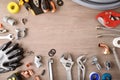 Plumbing materials and tools on wooden workbench top view background Royalty Free Stock Photo