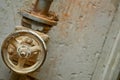 Plumbing. Sewage. Water valve, old rusty faucet in the basement Royalty Free Stock Photo