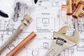 Plumbing Tools Arranged On House Plans Royalty Free Stock Photo