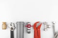 Plumbing tools and equipment on white with copy space Royalty Free Stock Photo