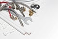 Plumbing tools and equipment on white with copy space Royalty Free Stock Photo