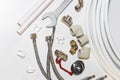 Plumbing tools and equipment on white with copy space Royalty Free Stock Photo