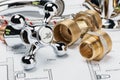 Plumbing and tools lying on drawing Royalty Free Stock Photo