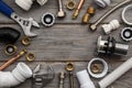 Plumbing tools, pipe and fixings on a rustic wooden background. Home improvement