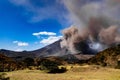 Plume of smoke billows from the active and destructive volcano at Batangan Royalty Free Stock Photo