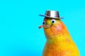 Plump kiwi-bird like pear character wearing a hat Royalty Free Stock Photo
