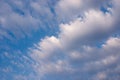 Plump white clouds in blue sky