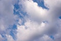 Plump white clouds in blue sky