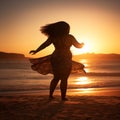 Plump woman dancing on beach Royalty Free Stock Photo