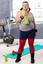 Plump young woman at the gym Royalty Free Stock Photo