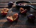 Plums and jam on dark table Royalty Free Stock Photo
