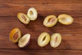 Plums on wood, halfed Royalty Free Stock Photo