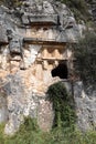 Plundered ancient lycian tombs of Myra near Demre, Turkey close up view Royalty Free Stock Photo