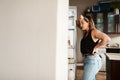 Plus size, chubby and hungry woman looking in a fridge, thinking of food or searching for meal while on a diet. Stressed Royalty Free Stock Photo