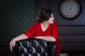 Plus size fashion model in red evening dress, fat woman on luxury interior, overweight female body Royalty Free Stock Photo
