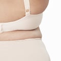 Plus size model beige lingerie apparel mockup body closeup Royalty Free Stock Photo