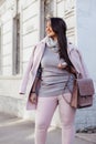 Plus size model in pink coat Royalty Free Stock Photo