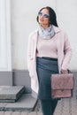 Plus size model in pink coat Royalty Free Stock Photo