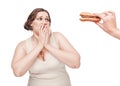 Plus size woman fearing unhealthy food Royalty Free Stock Photo