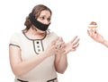 Plus size woman gagged stretching hands to pastry Royalty Free Stock Photo