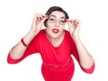 Plus size woman in glasses fixedly looking on you isolated. Top Royalty Free Stock Photo